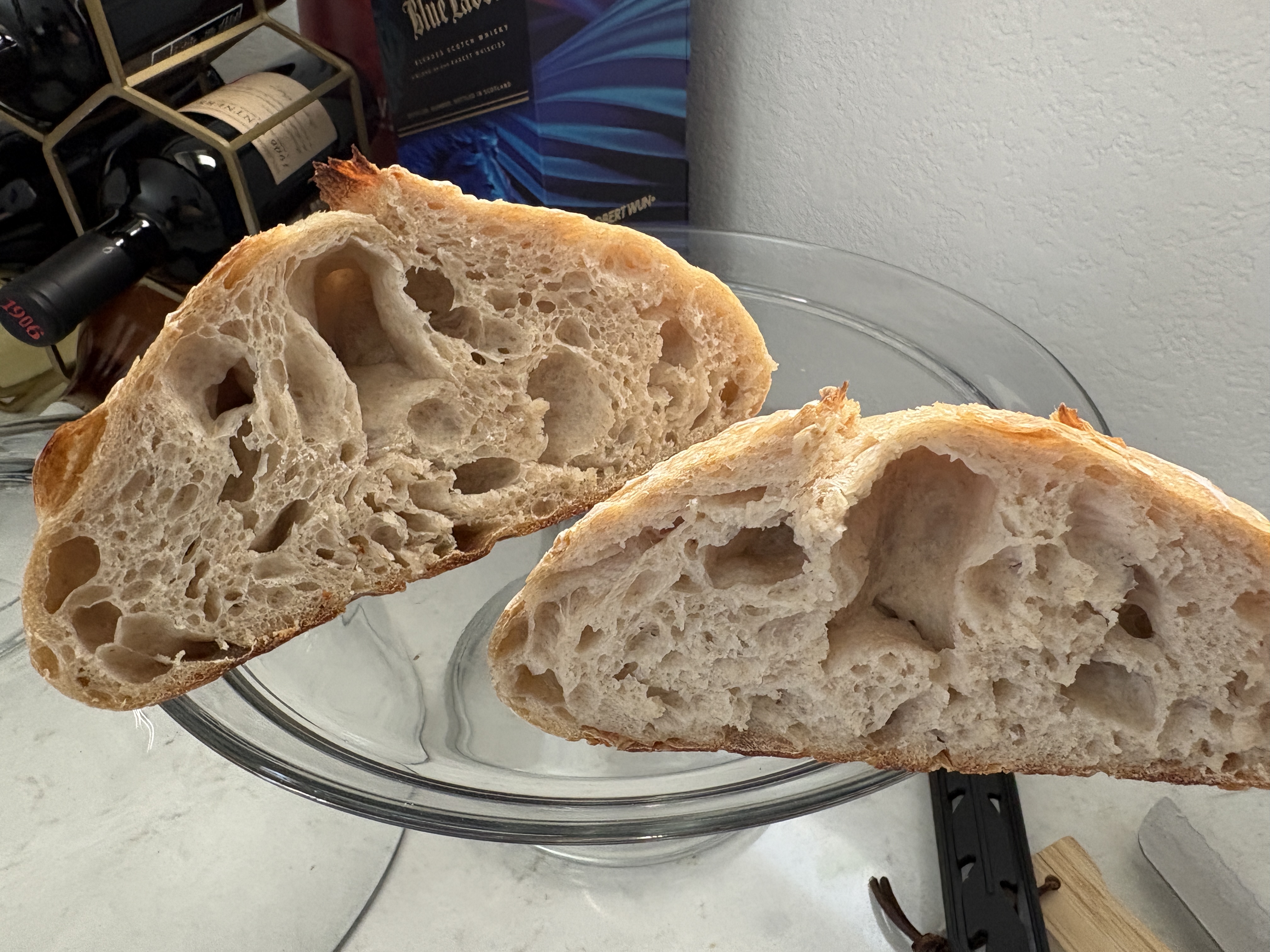 Artisan sourdough bread with an open, irregular crumb and high hydration texture